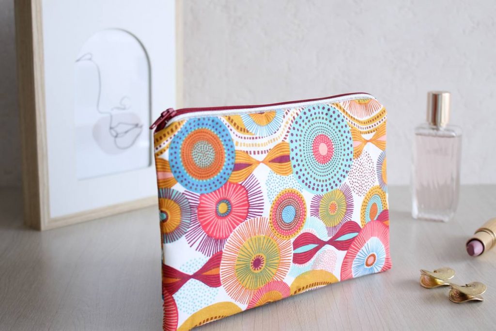 Pochette zippée Alna ronds blancs